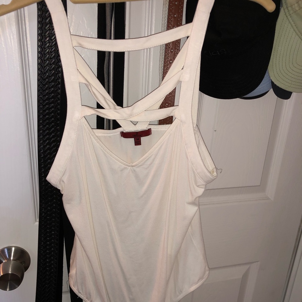White strappy body suit